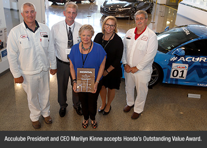 Acculube President and CEO Marilyn Kinne accepts Honda’s Outstanding Value Award.